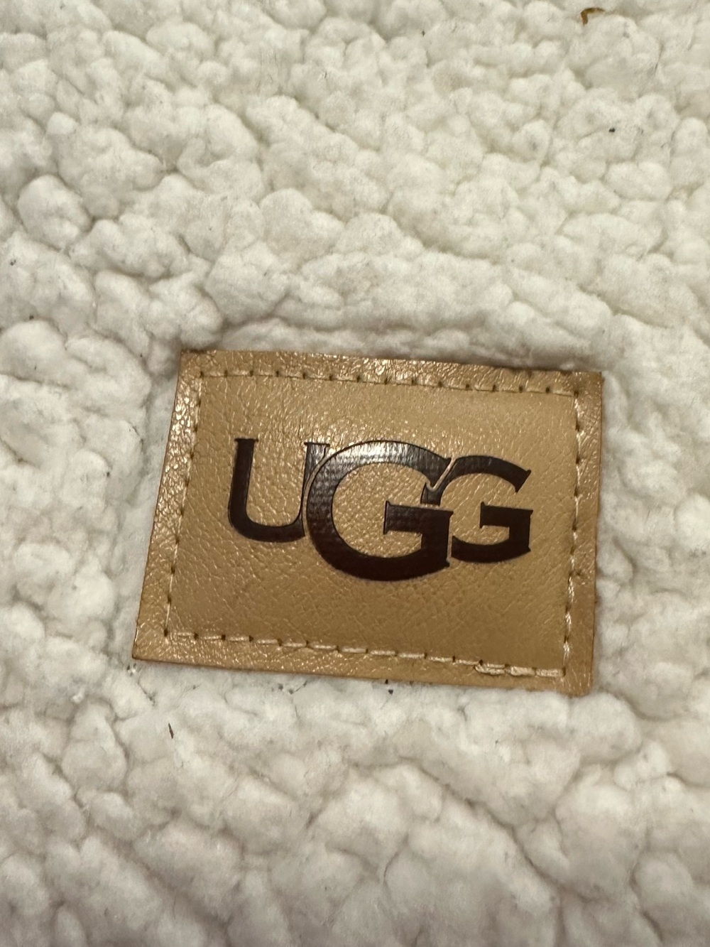 UGG Cream/Navy Sherpa Throw with Tan Logo Patch